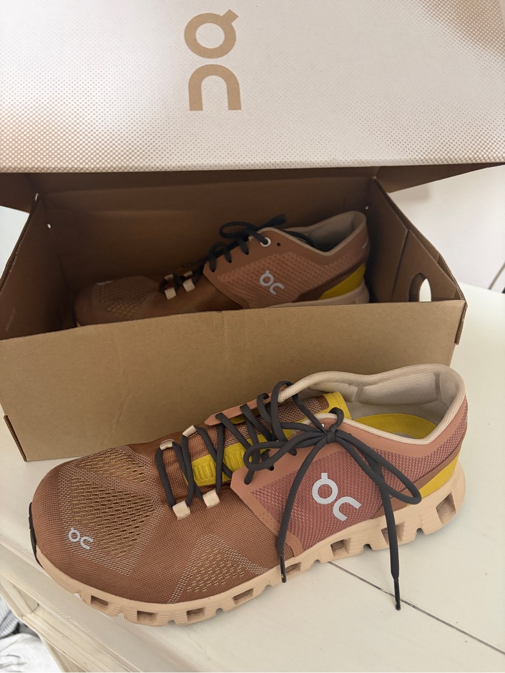 On cloud womens  Athletic Shoes in Brown copper with Yellow and Black Accents 10